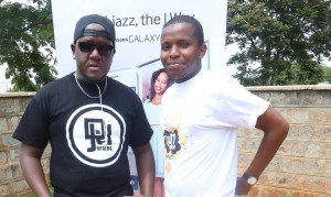 Amos & DJ Joe Mfalme outside K.U Radio Studio