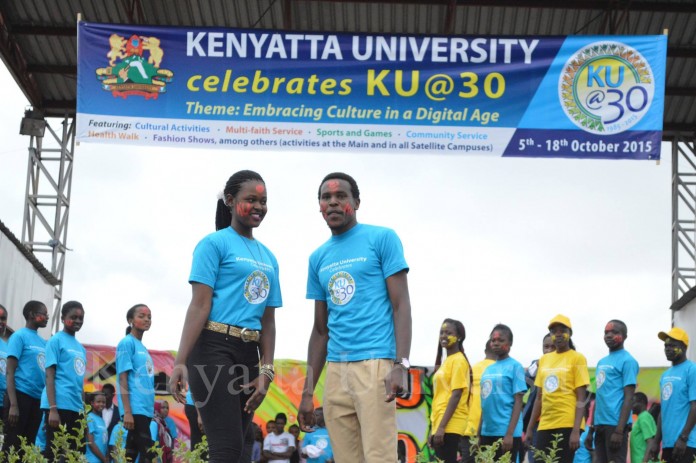 KU students performing KU@30 dance formation.